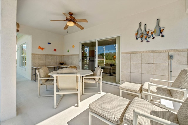 view of patio / terrace featuring ceiling fan and outdoor dining space