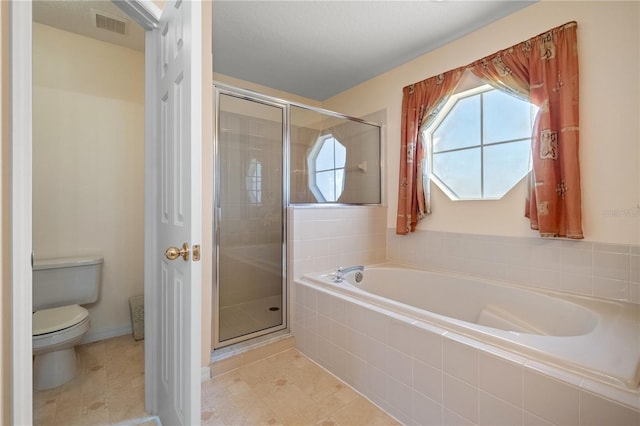 full bath with visible vents, tile patterned flooring, a shower stall, a garden tub, and toilet