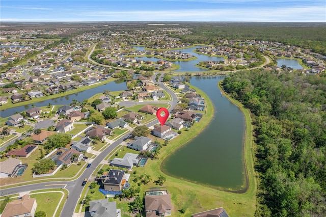 aerial view with a residential view and a water view