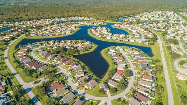 bird's eye view featuring a water view and a residential view