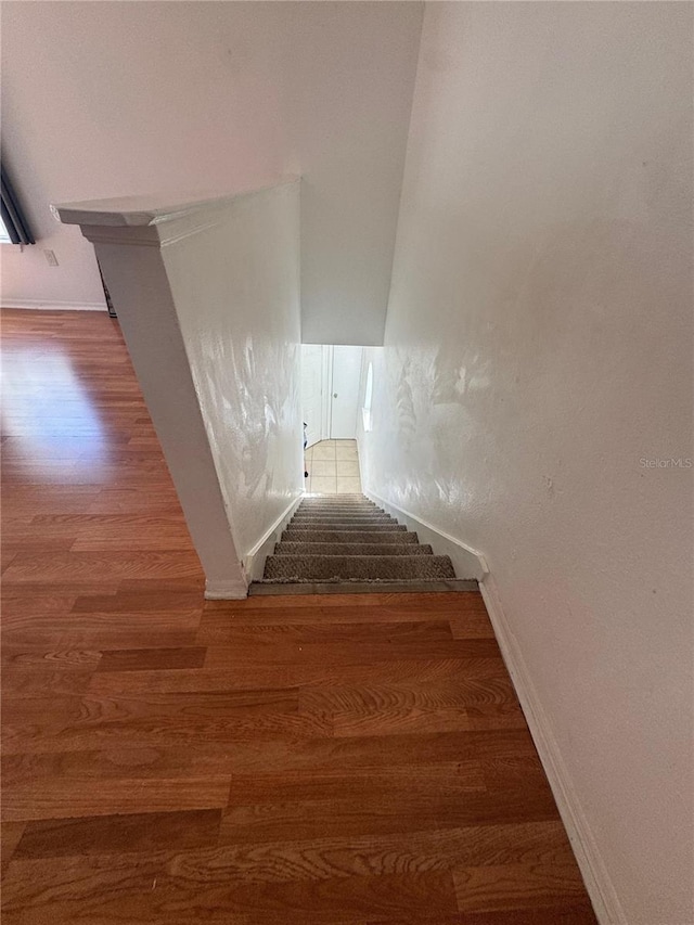 445 Fountainhead Cir Unit 264, Kissimmee, FL 34741 - stairway with wood finished floors and baseboards