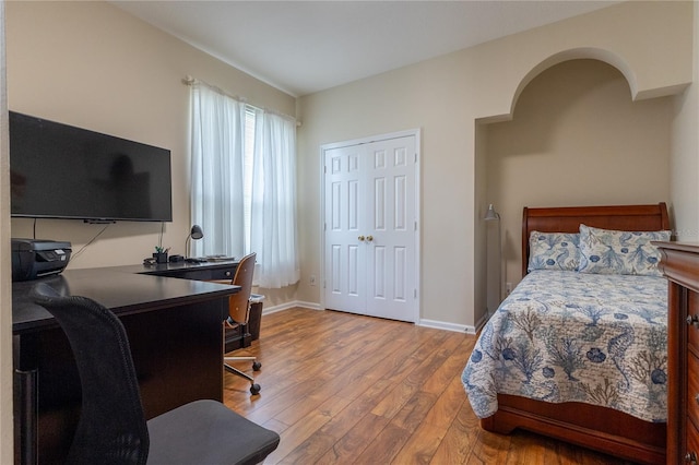 8204 Fan Palm Way, Kissimmee, FL 34747 - bedroom with hardwood / wood-style floors, baseboards, and a closet