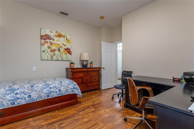 8204 Fan Palm Way, Kissimmee, FL 34747 - bedroom with wood finished floors and an office area