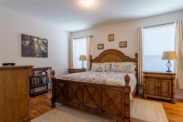 8204 Fan Palm Way, Kissimmee, FL 34747 - bedroom featuring wood finished floors