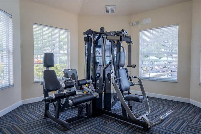 8204 Fan Palm Way, Kissimmee, FL 34747 - workout room with carpet floors and baseboards