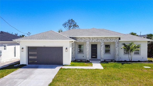 view of front facade with stucco siding, driveway, roof with shingles, an attached garage, and a front yard