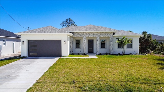 view of front facade featuring a garage, concrete driveway, a front lawn, and a shingled roof