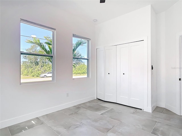 unfurnished bedroom featuring baseboards