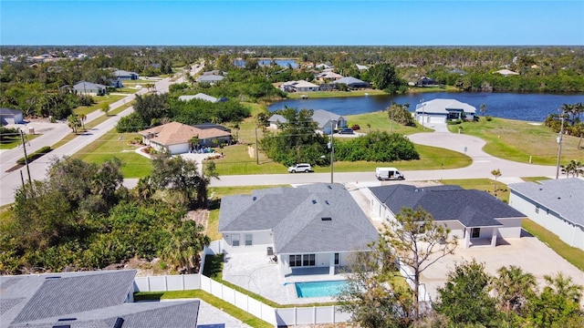 bird's eye view featuring a residential view and a water view