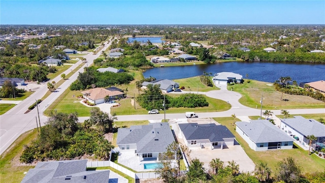 aerial view with a residential view and a water view