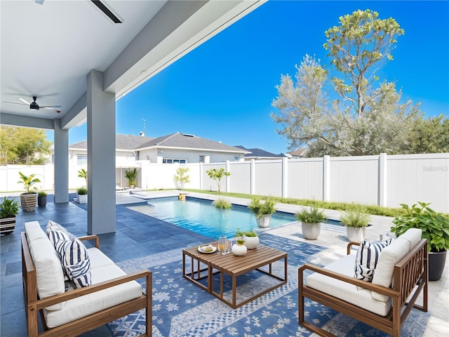 159 Antilla Dr, Rotonda West, FL 33947 - fenced backyard with outdoor lounge area, a ceiling fan, and a patio