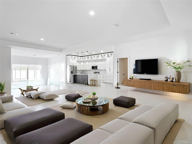 159 Antilla Dr, Rotonda West, FL 33947 - living area with recessed lighting and light tile patterned floors
