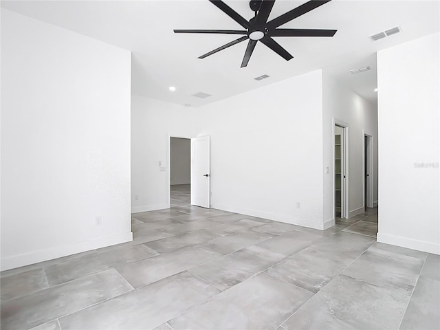 159 Antilla Dr, Rotonda West, FL 33947 - spare room with ceiling fan, baseboards, recessed lighting, and concrete flooring