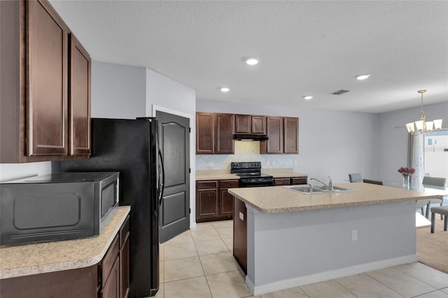 kitchen with visible vents, black electric range oven, a sink, under cabinet range hood, and light countertops