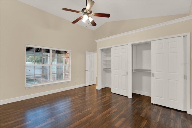 unfurnished bedroom featuring a ceiling fan, lofted ceiling, dark wood-style flooring, and baseboards