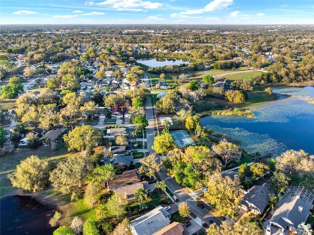 bird's eye view featuring a residential view and a water view