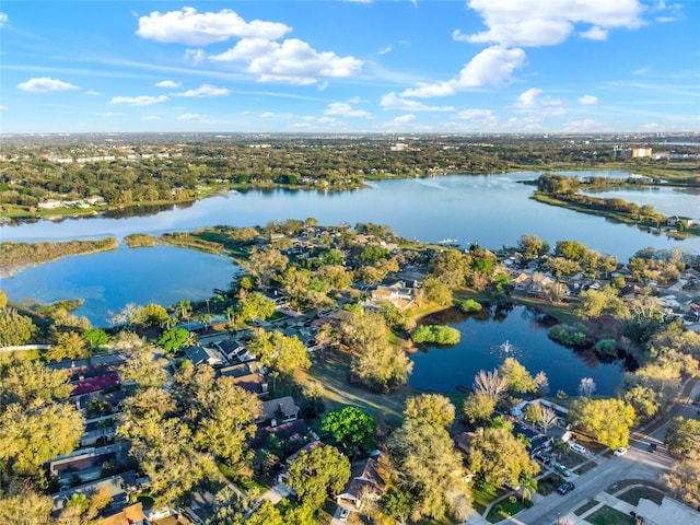 birds eye view of property featuring a water view