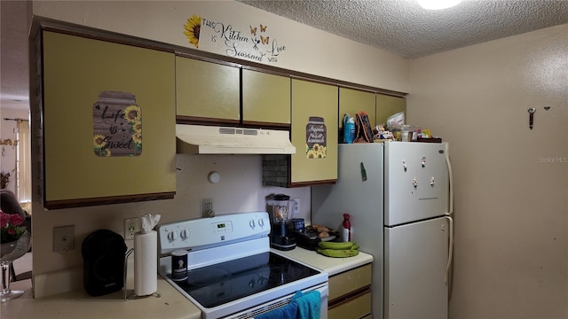 kitchen with white appliances, light countertops, under cabinet range hood, and a textured ceiling