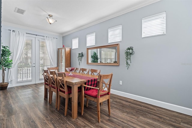 3304 Cat Brier Trl, Harmony, FL 34773 - dining area featuring visible vents, baseboards, dark wood finished floors, ornamental molding, and french doors