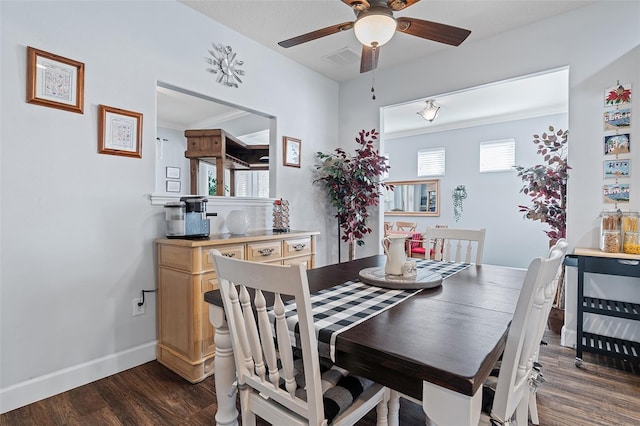 3304 Cat Brier Trl, Harmony, FL 34773 - dining room with a ceiling fan, visible vents, baseboards, dark wood finished floors, and crown molding