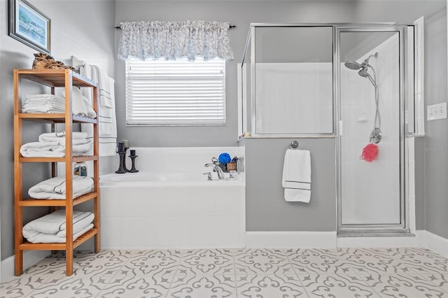 3304 Cat Brier Trl, Harmony, FL 34773 - bathroom featuring tile patterned floors, a shower stall, and a bath
