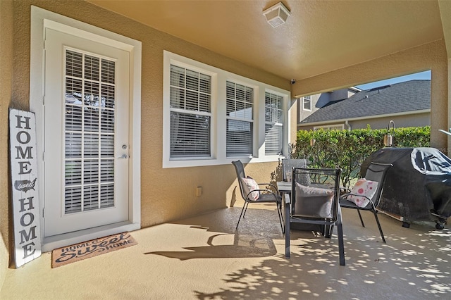 3304 Cat Brier Trl, Harmony, FL 34773 - view of patio with a grill