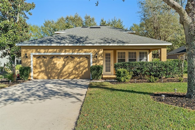 3304 Cat Brier Trl, Harmony, FL 34773 - view of front facade with roof with shingles, stucco siding, concrete driveway, an attached garage, and a front lawn