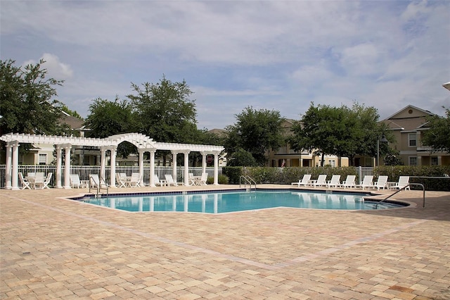 3304 Cat Brier Trl, Harmony, FL 34773 - pool with fence, a pergola, and a patio