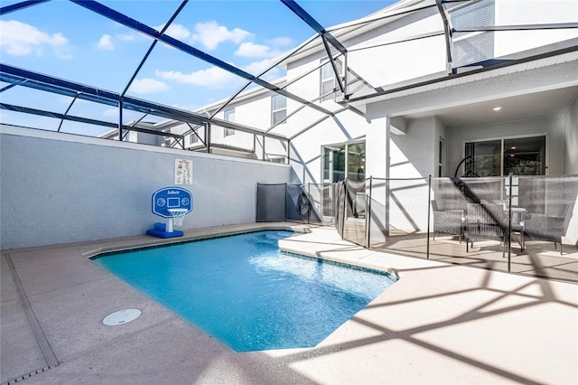 pool with a patio and a lanai