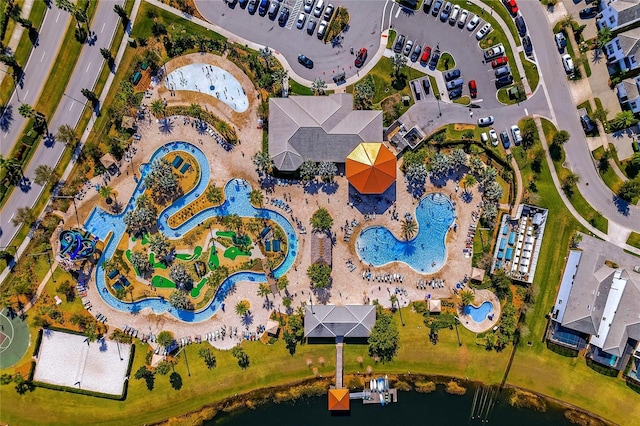 birds eye view of property featuring a water view