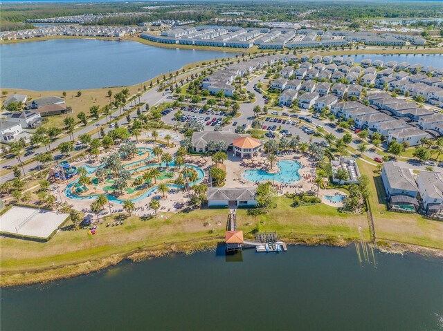 birds eye view of property with a residential view and a water view