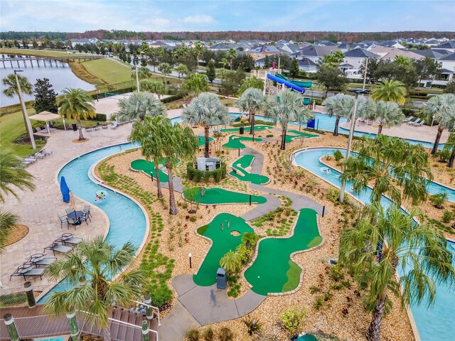 aerial view featuring a residential view and a water view