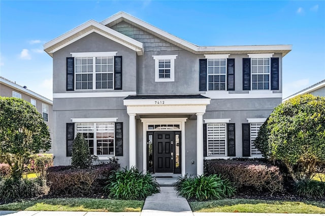 view of front of home featuring stucco siding