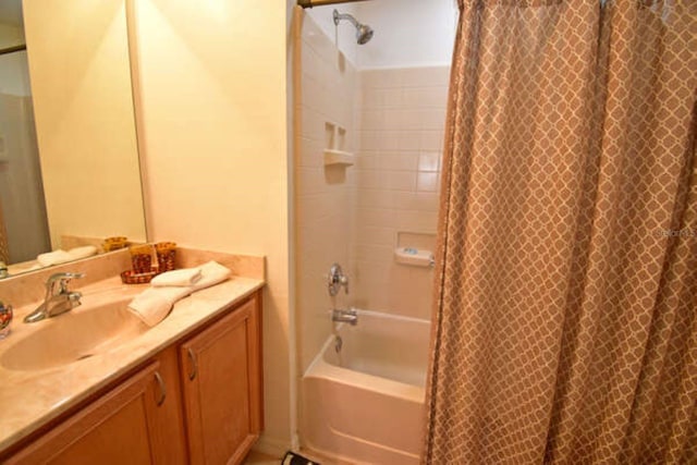 full bathroom with shower / bath combo and vanity