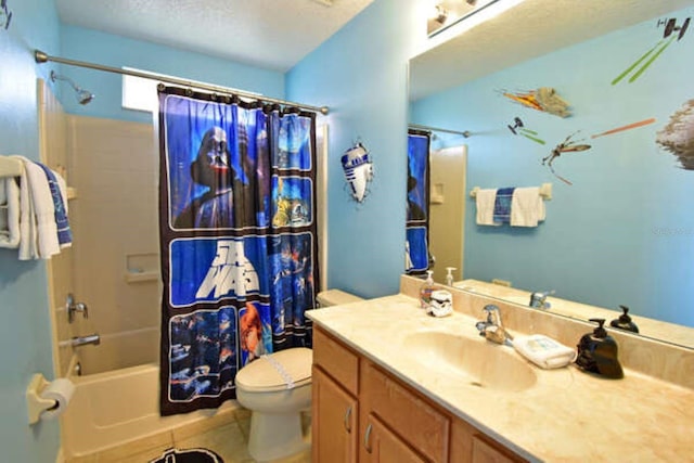 full bathroom with shower / tub combo, toilet, tile patterned floors, a textured ceiling, and vanity