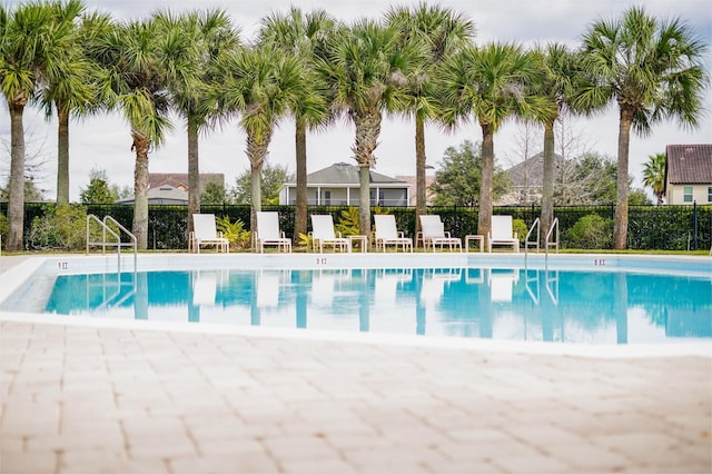 pool featuring fence