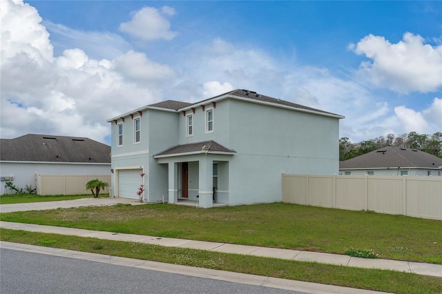 view of front facade with stucco siding, an attached garage, fence, driveway, and a front lawn