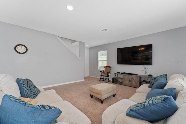 carpeted living room with baseboards, visible vents, and recessed lighting