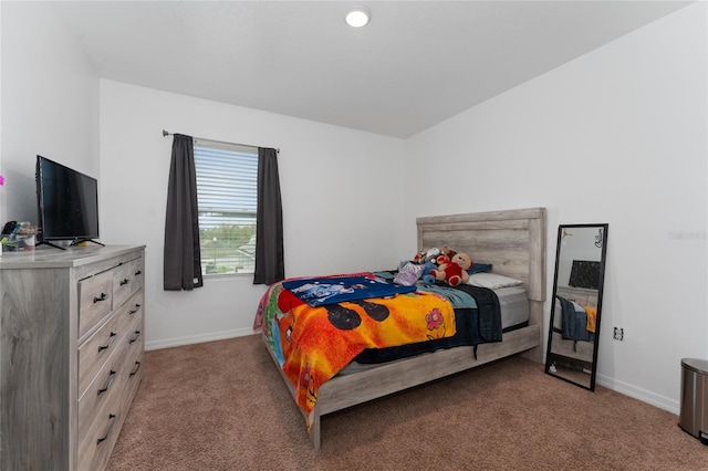 carpeted bedroom with baseboards