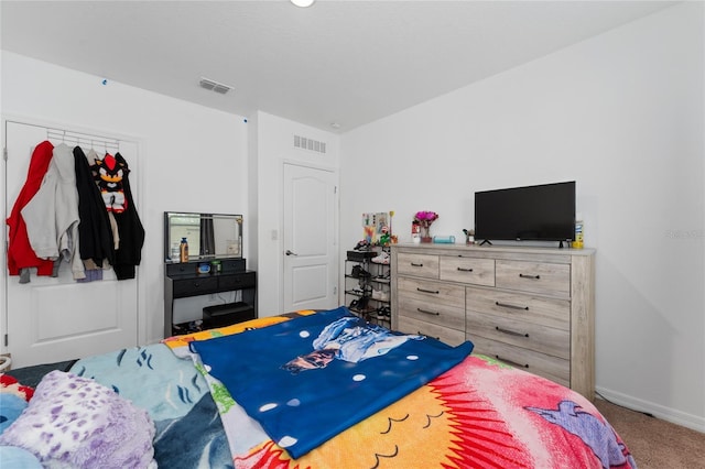 bedroom featuring carpet, visible vents, and baseboards