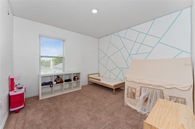 carpeted bedroom featuring baseboards and recessed lighting