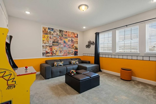 interior space with baseboards and recessed lighting