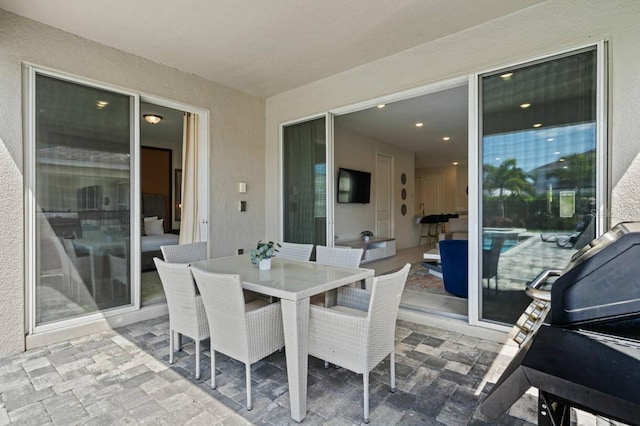 view of patio with outdoor dining space