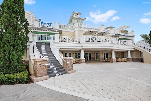 view of building exterior featuring stairs