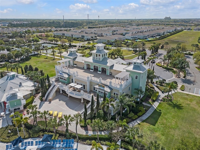 birds eye view of property with a residential view