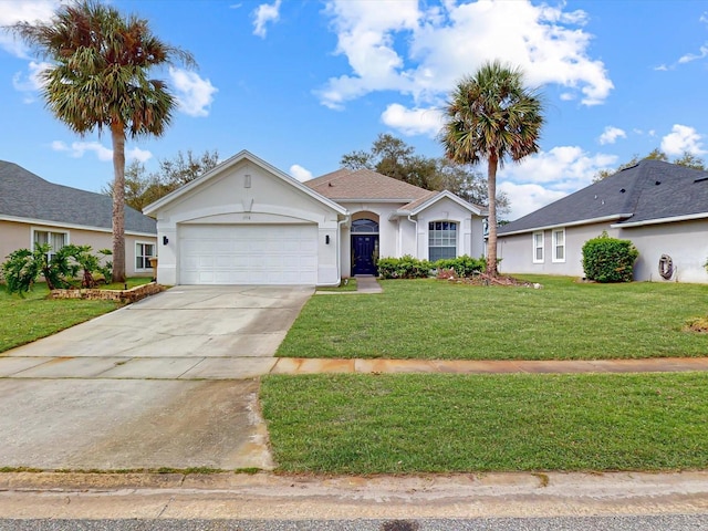 single story home featuring a garage, stucco siding, driveway, and a front yard