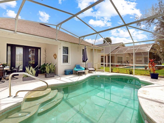 1718 Golfview Dr, Kissimmee, FL 34746 - outdoor pool featuring glass enclosure and a patio area