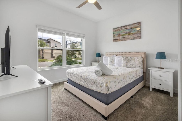 bedroom with carpet flooring, a ceiling fan, and baseboards