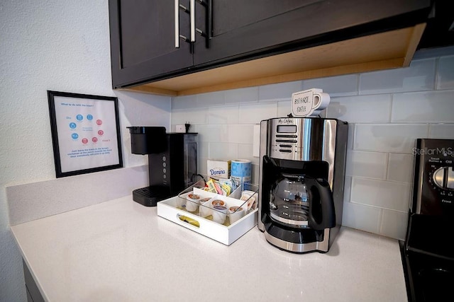 interior details featuring decorative backsplash and light countertops