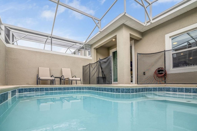 pool featuring glass enclosure